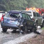 One of the vehicles involved in a multi-vehicle crash Tuesday morning sustained heavy rear-end damage. (Brian Kelly | Bainbridge Island Review)