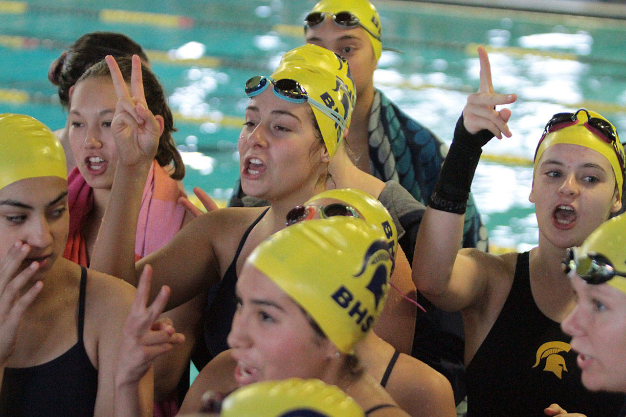 The Spartans gather for a group cheer before the start of the 34th annual Spartan Relays. (Brian Kelly | Bainbridge Island Review)