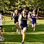 Steven Albergine photo | Bainbridge High School cross country runners (left to right) freshman Will Browning, senior Reuben Allen and sophomore Mace Korytko at the teams first league meet at Woodland Park in Seattle.