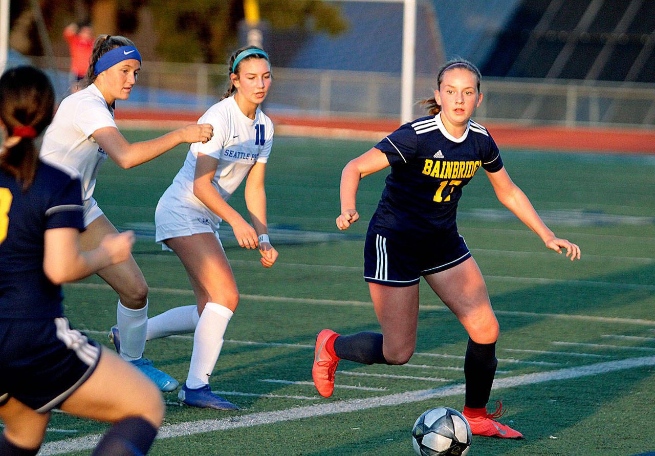 Samantha Batson looks to pass to a Spartan teammate in action against Seattle Prep Tuesday at Bainbridge Highs Memorial Stadium. (Brian Kelly | Bainbridge Island Review)