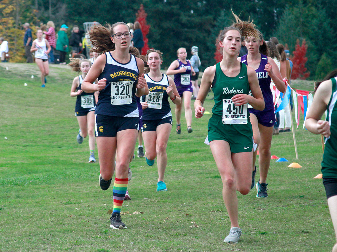 Luciano Marano | Bainbridge Island Review - Runners from four high schools converged on Battle Point Park recently for the Bainbridge High School cross country teams sole home meet of the season.