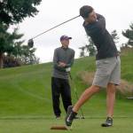 Luciano Marano | Bainbridge Island Review - tees off during the Spartans home match against Garfield Monday.                                Luciano Marano | Bainbridge Island Review - Justin Marten tees off during the Spartans home match against Garfield Monday.