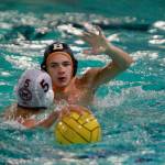 Luciano Marano | Bainbridge Island Review - The Bainbridge High School varsity boys water polo team battled back from an early deficit Tuesday to score a 13-11 win against their visiting rivals from Mercer Island.