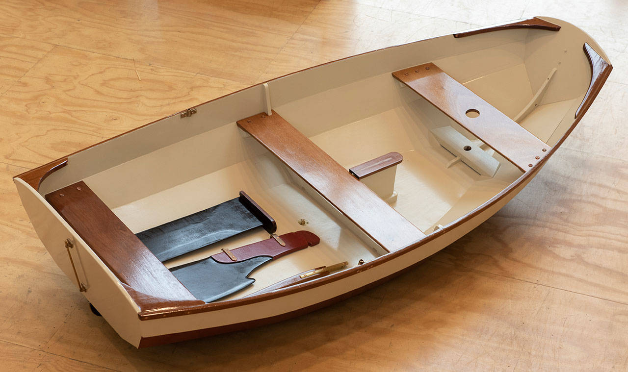 Photo courtesy of Jeanne Huber | A Nutshell Pram, designed by boatbuilder Joel White and built under the guidance of an experienced boat builder as a class project at Bainbridge Artisan Resource Network, will be auctioned off later this month as part of the BARN Bazaar fundraiser.