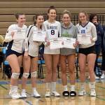 Julia Jakubik (far left) and Allie Wildsmith (center) were named to the Second Team All Metro Volleyball Team. (Photo courtesy of Dominique Atherley)