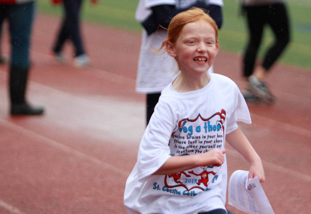 A drippy dash: St. Cecilia jog-a-thon returns to Bainbridge High School track | Photo gallery
