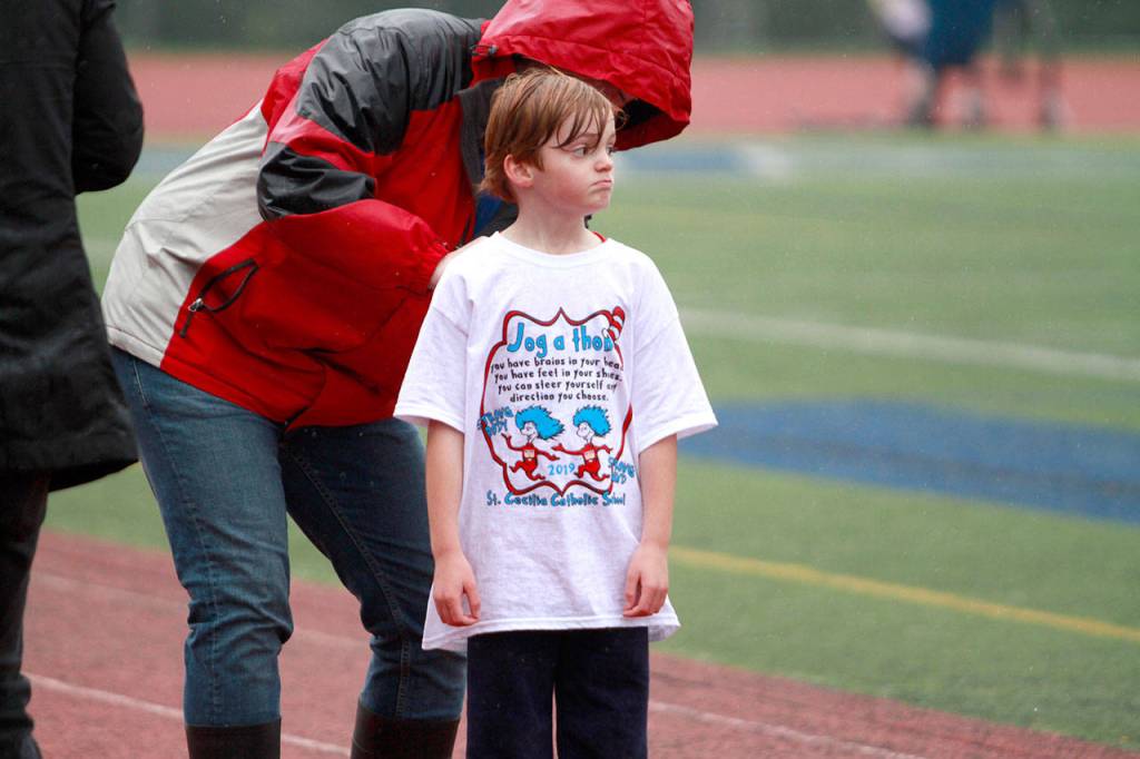 A drippy dash: St. Cecilia jog-a-thon returns to Bainbridge High School track | Photo gallery