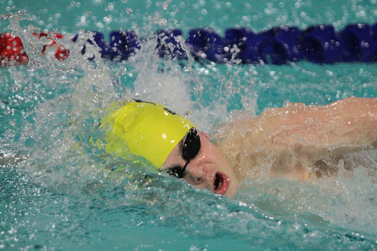 Spartan swimmer Thomas Witty races in the 200-yard IM during Bainbridges home opener against Roosevelt. (Brian Kelly | Bainbridge Island Review)