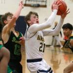 Luciano Marano | Bainbridge Island Review - Spartan junior Andrew Ward looks to make a layup during last Fridays home game against Roosevelt.
