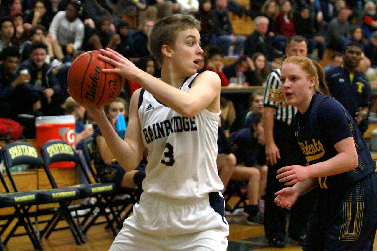 Luciano Marano | Bainbridge Island Review - Bainbridge junior Audrey Nelson looks to pass to a teammate during last Fridays home game against West Seattle.