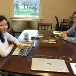 Reporters Leona Vaughn, left, and Cameron Sheppard, right, at work in the new office on the state Capitol campus. (Sandy Stokes photo)