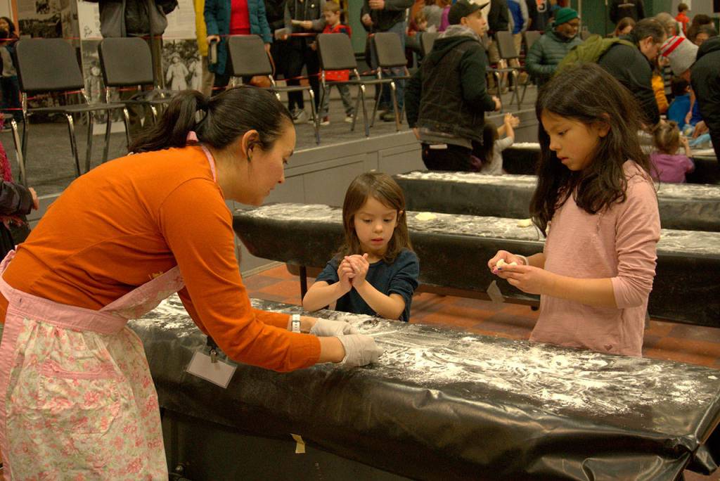 More mochi moments: Annual New Year’s gathering returns to Woodward Middle School | Photo gallery