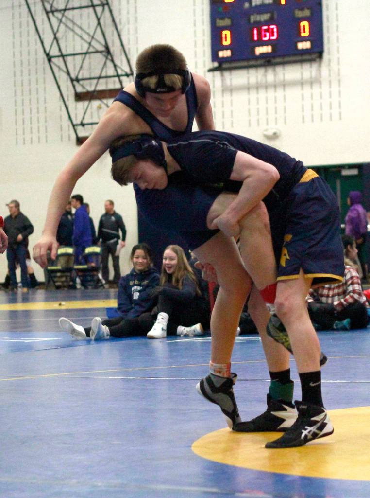 Island wrestlers stand tall at annual invitational | Photo gallery