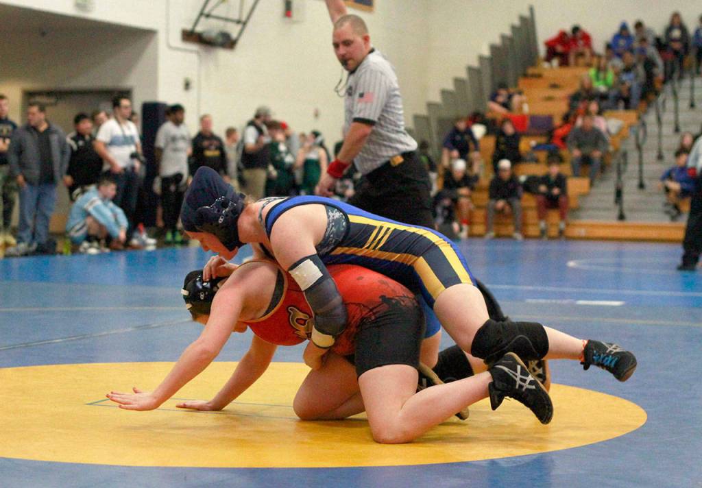 Island wrestlers stand tall at annual invitational | Photo gallery