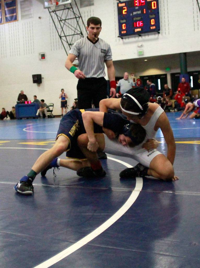 Island wrestlers stand tall at annual invitational | Photo gallery