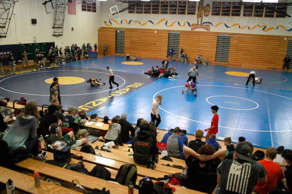 Island wrestlers stand tall at annual invitational | Photo gallery