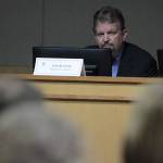 Bainbridge Island Hearing Examiner Ted Hunter opens the hearing on the Winslow Hotel proposal. (Brian Kelly | Bainbridge Island Review)