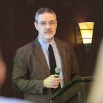 Mark Swaney, a veterinarian who has been the owner of Day Road Animal Hospital for 20 years, talks to local and state officials gathered Friday at the Suquamish Clearwater Casino Resort about the proposal for a detention pond on his Bainbridge property that would be built as part of the Day Road roundabout project. (Brian Kelly | Bainbridge Island Review)