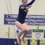 Kareese Pippinger competes on the balance beam for Bainbridge during its Senior Night meet. (Brian Kelly | Bainbridge Island Review)