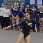 Katharine Cooper, shown here competing on floor during the Senior Night meet at Bainbridge High, has qualified for the state 3A championships. (Brian Kelly | Bainbridge Island Review)
