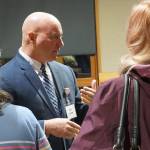 Joseph Joe Clark, former deputy police chief of the Norfolk Police Department in Norfolk, Virginia, talks to Bainbridge residents at a meet-and-greet in November. (Luciano Marano | Bainbridge Island Review)
