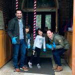 Dave and Karena Teves, and their children Kala and Kawika, ring the tower bells at St. Barnabas Episcopal Church to keep the Sunday morning tradition going. (Jim Friedrich photo)