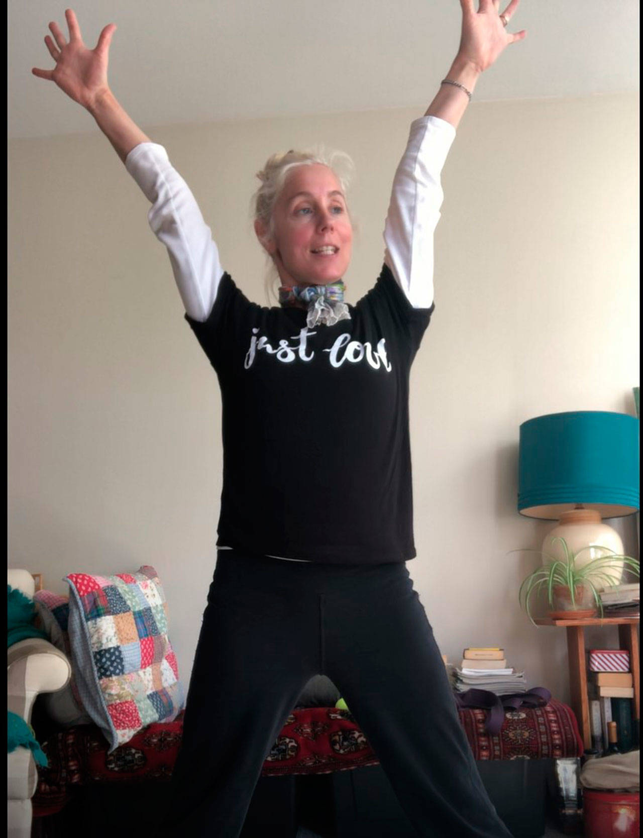 Helen Heaslip, an instructor at the Bainbridge Island Senior Community Center, leads a morning exercise class on a YouTube video. (Photo courtesy of the Bainbridge Island Senior Community Center)