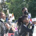 Demonstrators call out to attendees during a protest in Winslow. Photo by Nick Twietmeyer