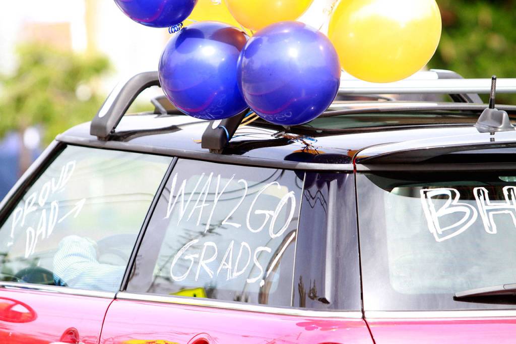 Photo gallery | Pomp despite circumstance: Drive-thru commencement celebrates island grads