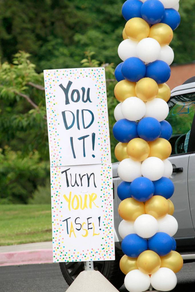 Photo gallery | Pomp despite circumstance: Drive-thru commencement celebrates island grads