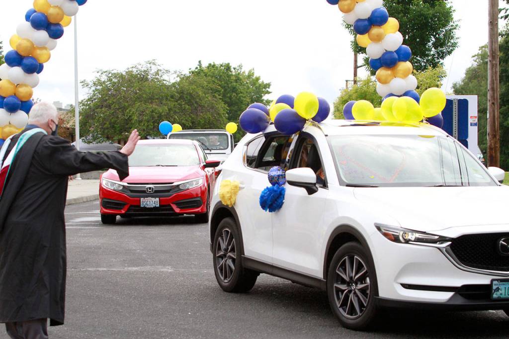 Photo gallery | Pomp despite circumstance: Drive-thru commencement celebrates island grads
