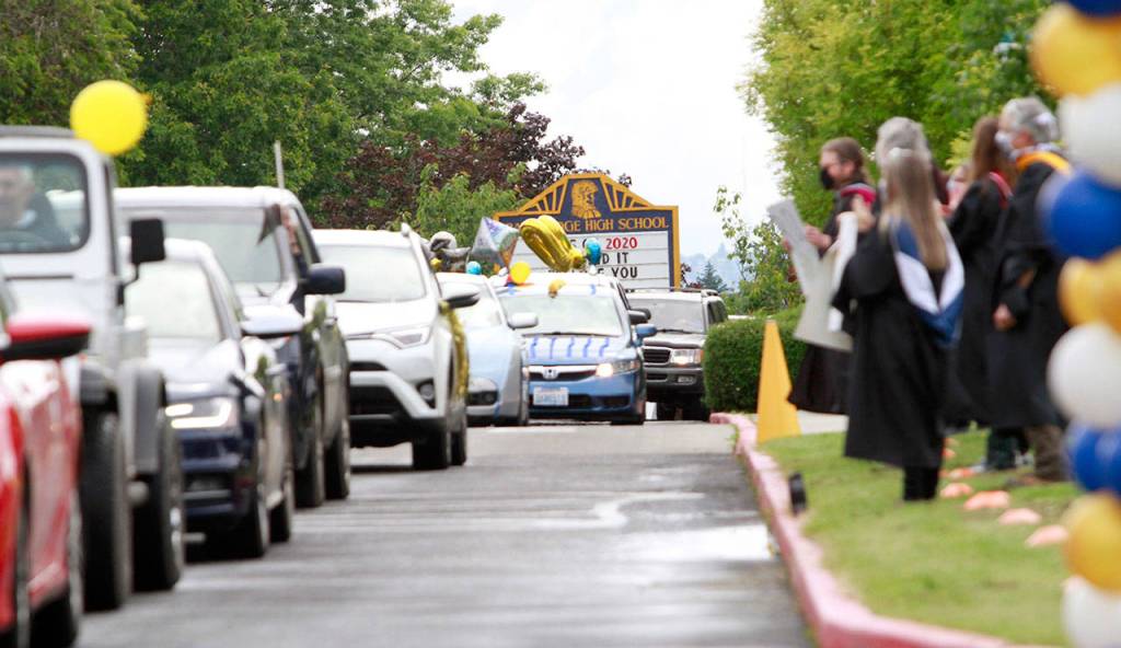 Photo gallery | Pomp despite circumstance: Drive-thru commencement celebrates island grads