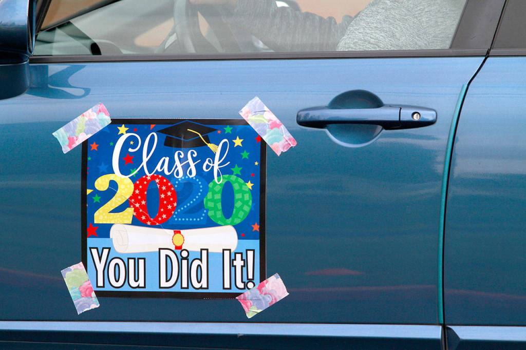 Photo gallery | Pomp despite circumstance: Drive-thru commencement celebrates island grads