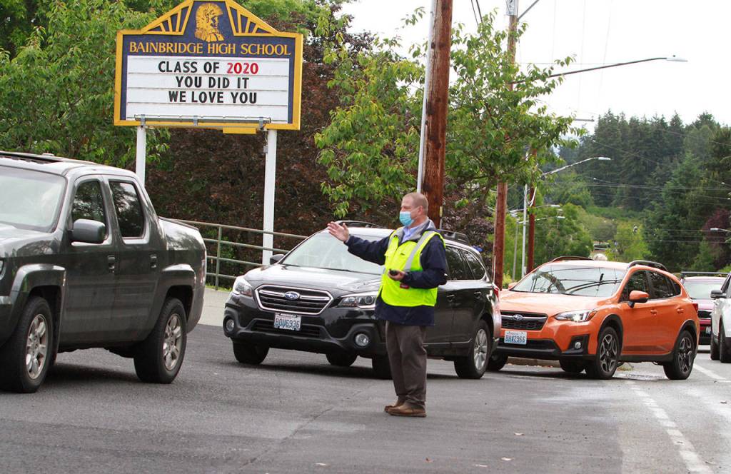 Photo gallery | Pomp despite circumstance: Drive-thru commencement celebrates island grads