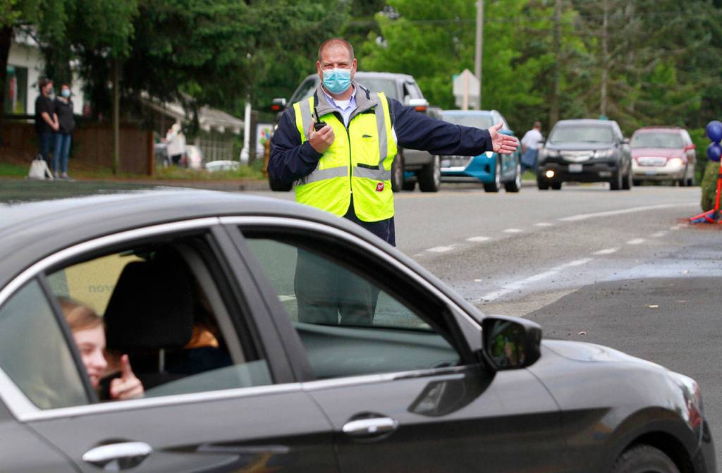 Photo gallery | Pomp despite circumstance: Drive-thru commencement celebrates island grads