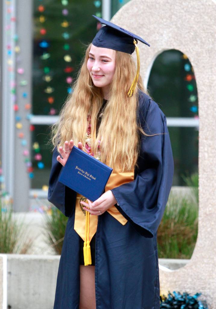 Photo gallery | Pomp despite circumstance: Drive-thru commencement celebrates island grads