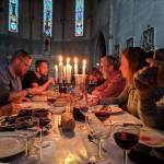 Carla Mackey photo | Pilgrims enjoy a meal in a converted cathedral.