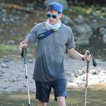Island resident Greg Nance pulls up to the end of Point Monroe Drive near Fay Bainbridge Park during his endurance run around Bainbridge. (Mark Krulish/Kitsap News Group)