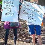 Locals rally in support of postal service