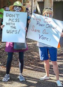 Locals rally in support of postal service