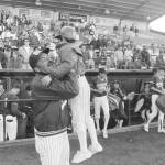 Contributed photo by the Taylor Family                                Virgil Taylor celebrates with his son, David, who served as the bat boy for North Kitsaps 1988 state championship team.