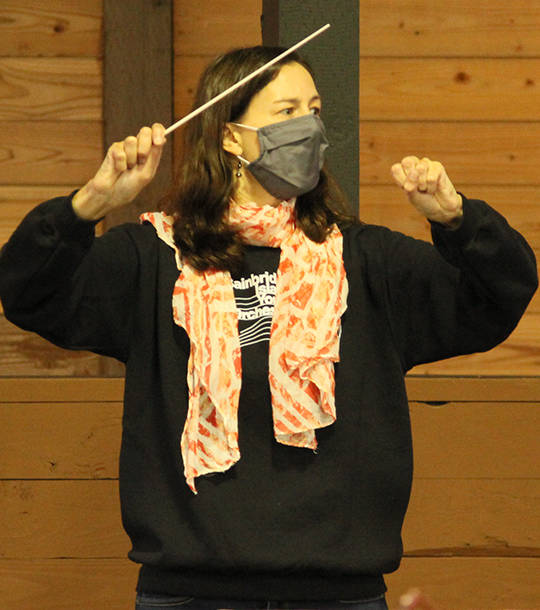 Justine Jeanotte conducts the beginning orchestra.