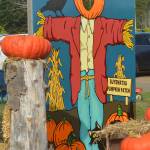 One of the hole-in-the-billboard picture locations is a scarecrow.