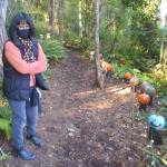 Donna Harui takes a walk along the Trail of Pumpkins. Steve Powell/Bainbridge Island Review photos