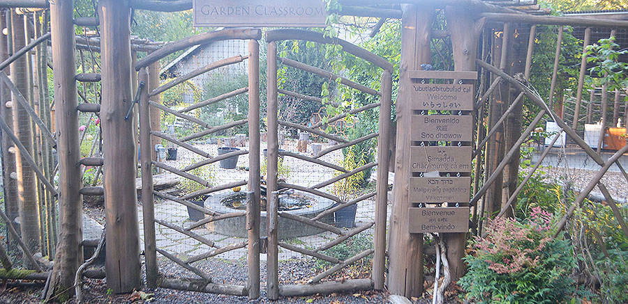 If you go through this artistic gate you will be in the garden of IslandWood.