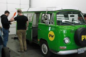 Mark Krulish|Kitsap News Group
EV Works technicians take a look at Joule, the shops electric Volkswagen bus.