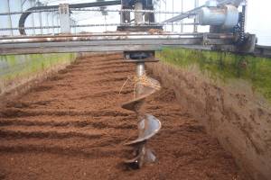 Steve Powell | Bainbridge Island Review photographs
An auger mixes up the compost material in an enclosed building.