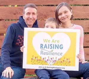 Krzystofa McDonough, board president, at right, and her family.