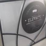 The Elevate logo at the front counter.