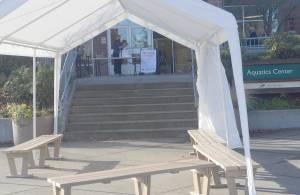 COVID testing sites, similar to this one at the swimming pool, will be placed around schools for students when they go back to in-person learning. Steve Powell/Bainbridge Island Review